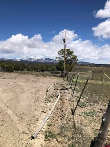 a view of a road with an ocean