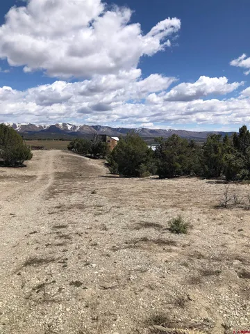 a view of lake with sunset
