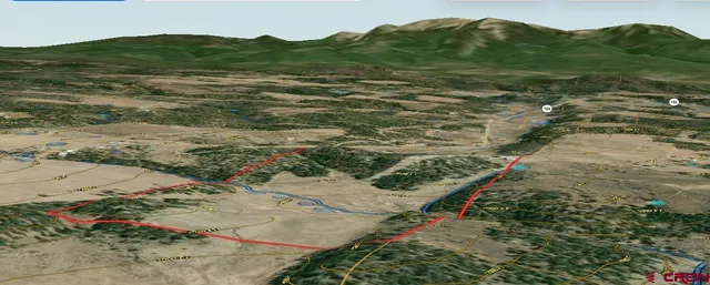 a view of a lake with beach