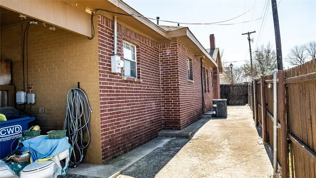 a view of a patio with a chairs and table in the patio