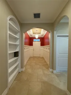a large kitchen with a large counter top space