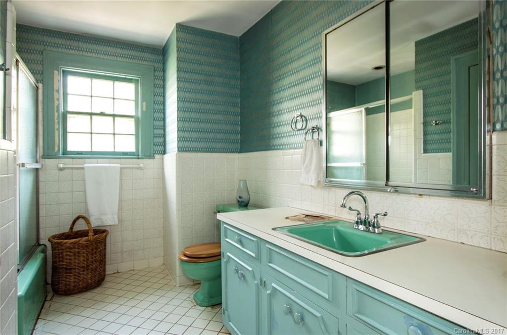 528 North Main Street Rutherfordton, NC 28139 - Photo 14 of 22 a bathroom with a sink and a mirror