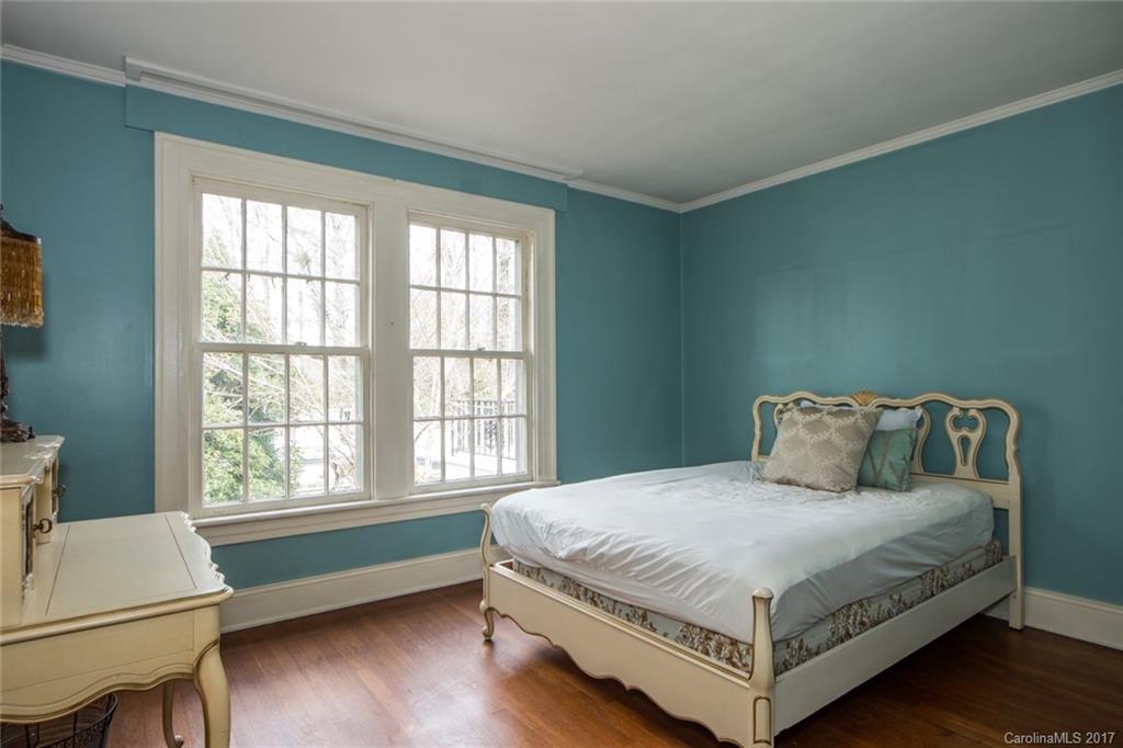 528 North Main Street Rutherfordton, NC 28139 - Photo 15 of 22 a bed sitting in a bedroom next to a window