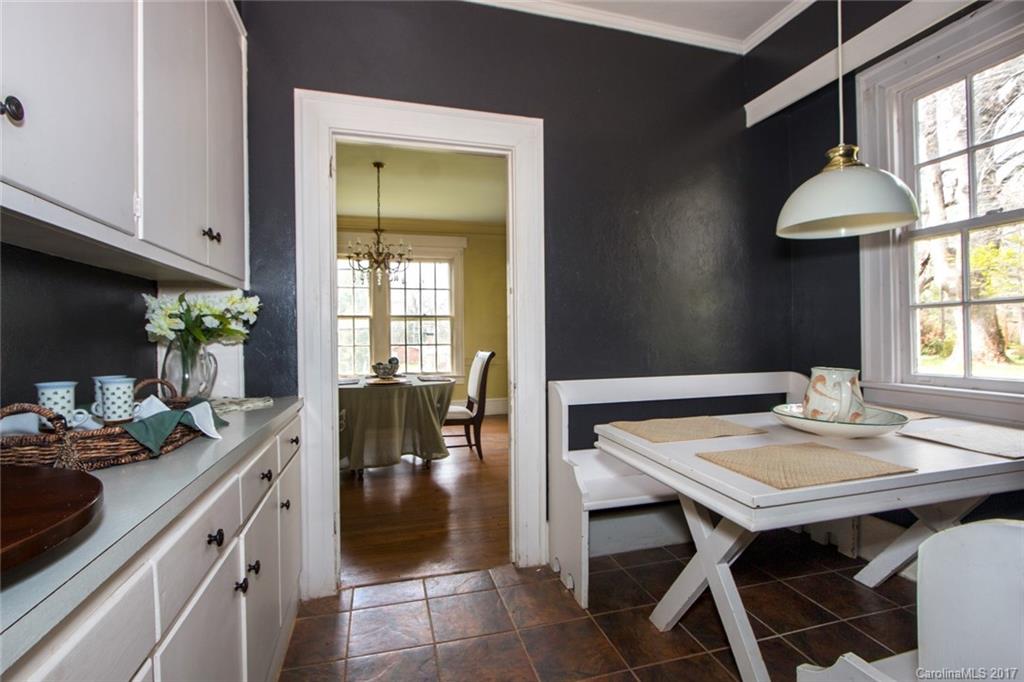 528 North Main Street Rutherfordton, NC 28139 - Photo 9 of 22 a kitchen with a table and chairs in it