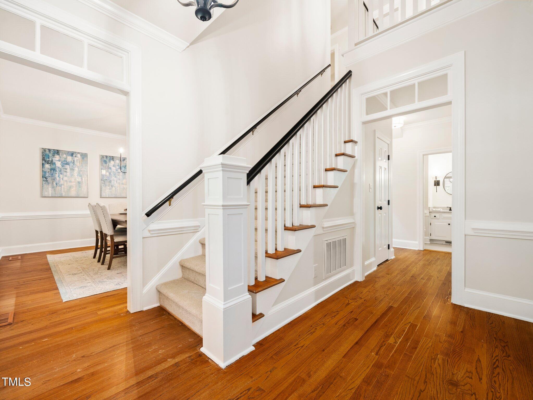 2900 Kenwick Court Raleigh, NC 27613 - Photo 4 of 34 a view of entryway and hall with wooden floor