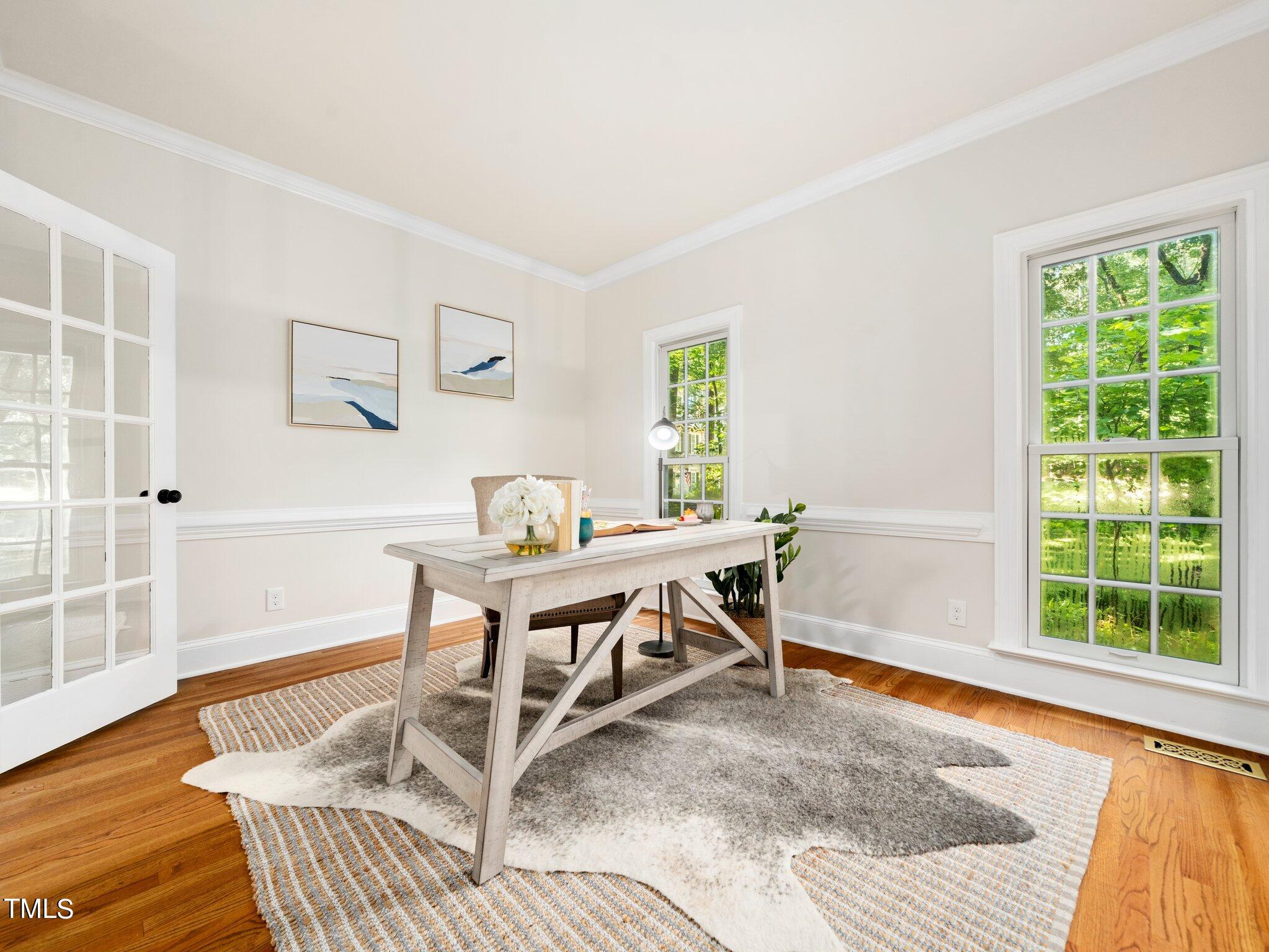2900 Kenwick Court Raleigh, NC 27613 - Photo 7 of 34 a view of a livingroom with furniture and a window
