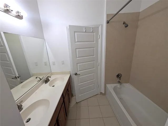 a bathroom with a sink toilet and tub