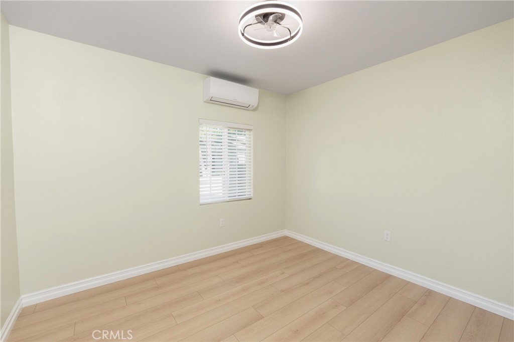 3895 Castleman Street Riverside, CA 92503 - Photo 13 of 22 an empty room with a window