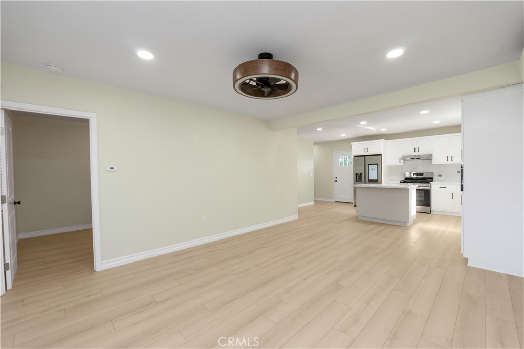 3895 Castleman Street Riverside, CA 92503 - Photo 18 of 22 a view of a kitchen with a sink and refrigerator