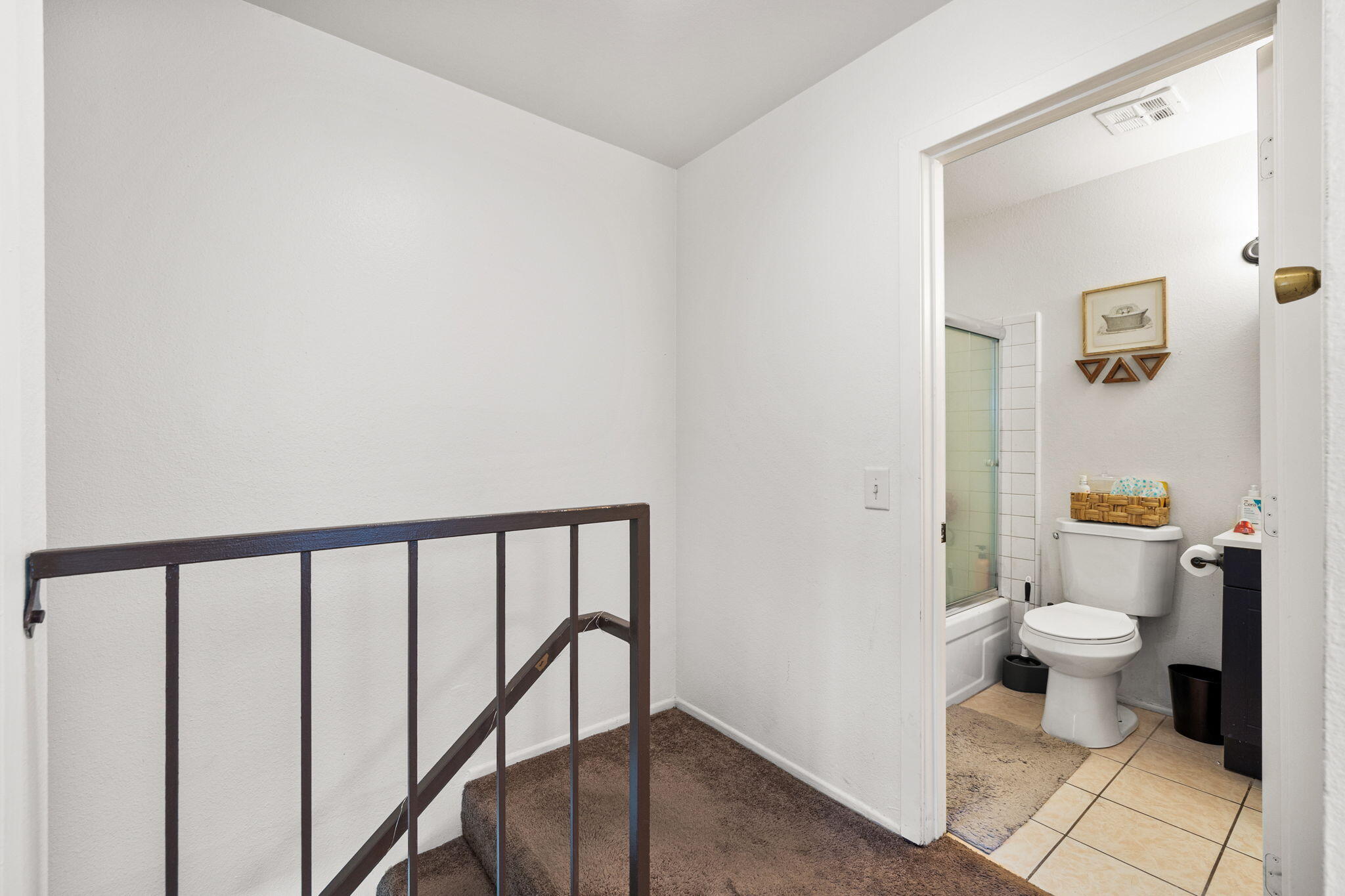 72632 Raven Road, Unit 2 Palm Desert, CA 92260 - Photo 13 of 30 a bathroom with a toilet and a shower