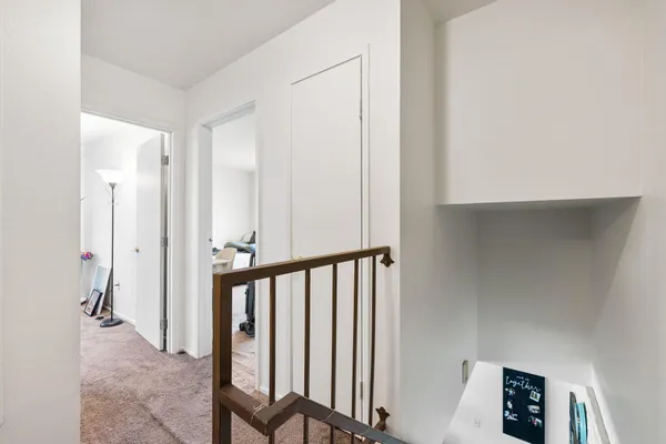 a view of a hallway with workspace