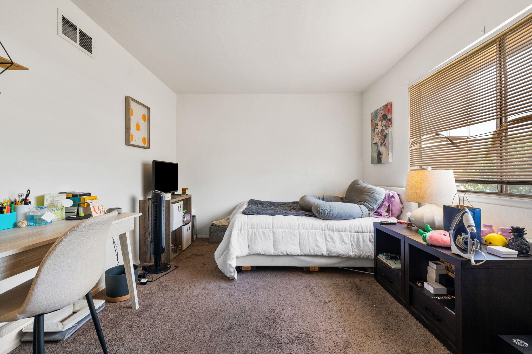 72632 Raven Road, Unit 2 Palm Desert, CA 92260 - Photo 17 of 30 a bedroom with a bed a desk and chair