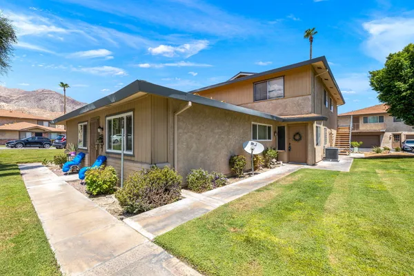 a front view of a house with patio