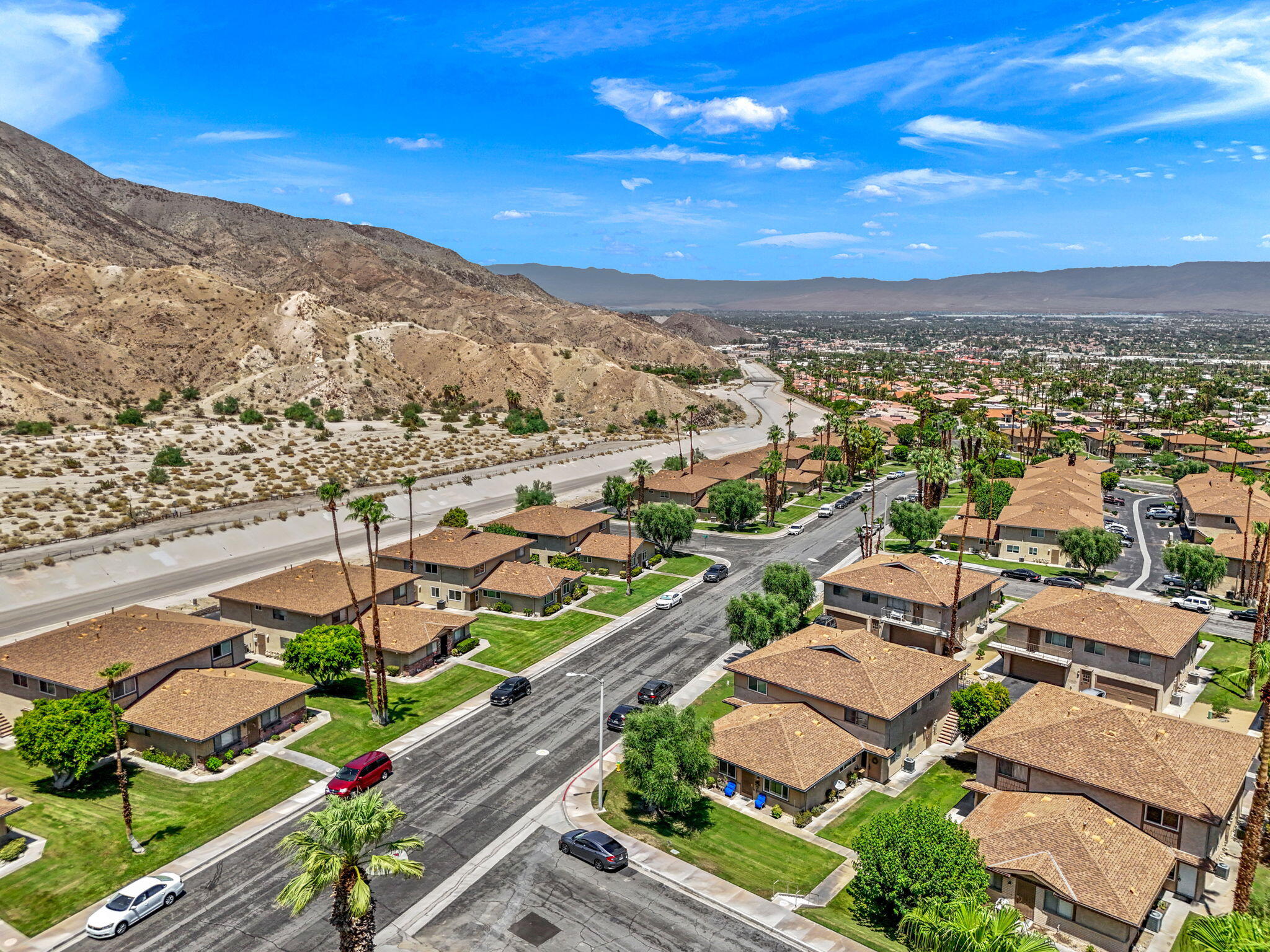 72632 Raven Road, Unit 2 Palm Desert, CA 92260 - Photo 30 of 30 an aerial view of residential houses with outdoor space