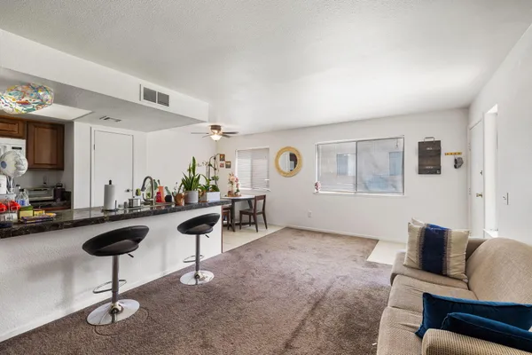 a view of a livingroom with furniture and a couch