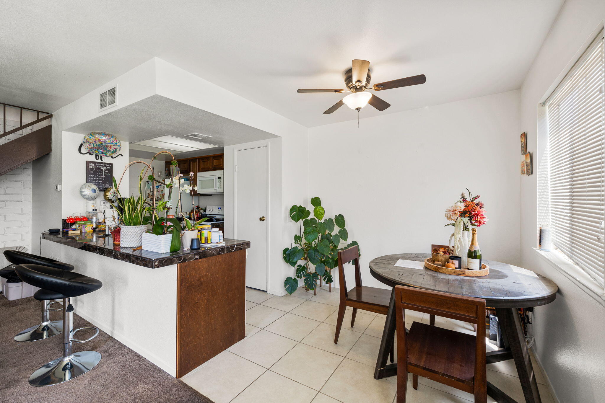 72632 Raven Road, Unit 2 Palm Desert, CA 92260 - Photo 6 of 30 a dining room with furniture and window