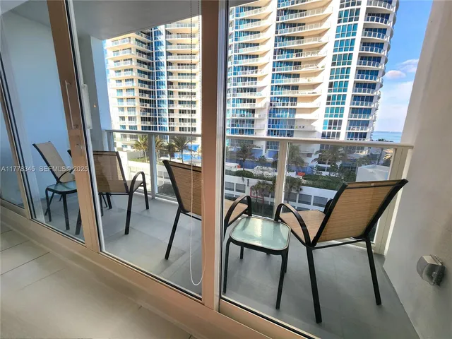 a view of a room with a window