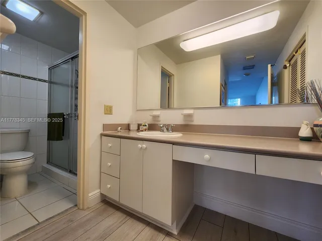 a bathroom with a sink and a toilet