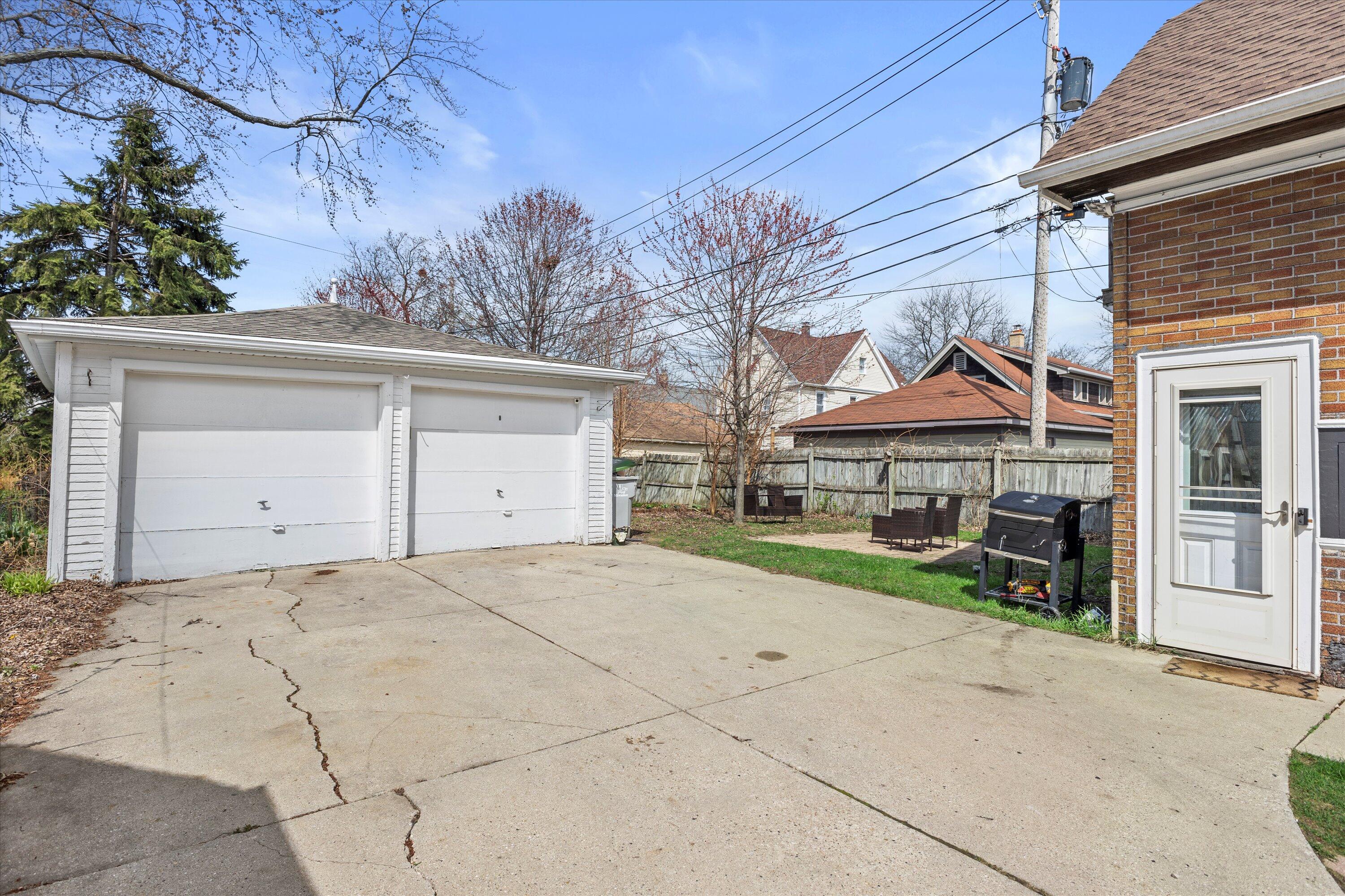 159 North 59th Street Milwaukee, WI 53213 - Photo 18 of 34 Detached 2-car garage with private driveway