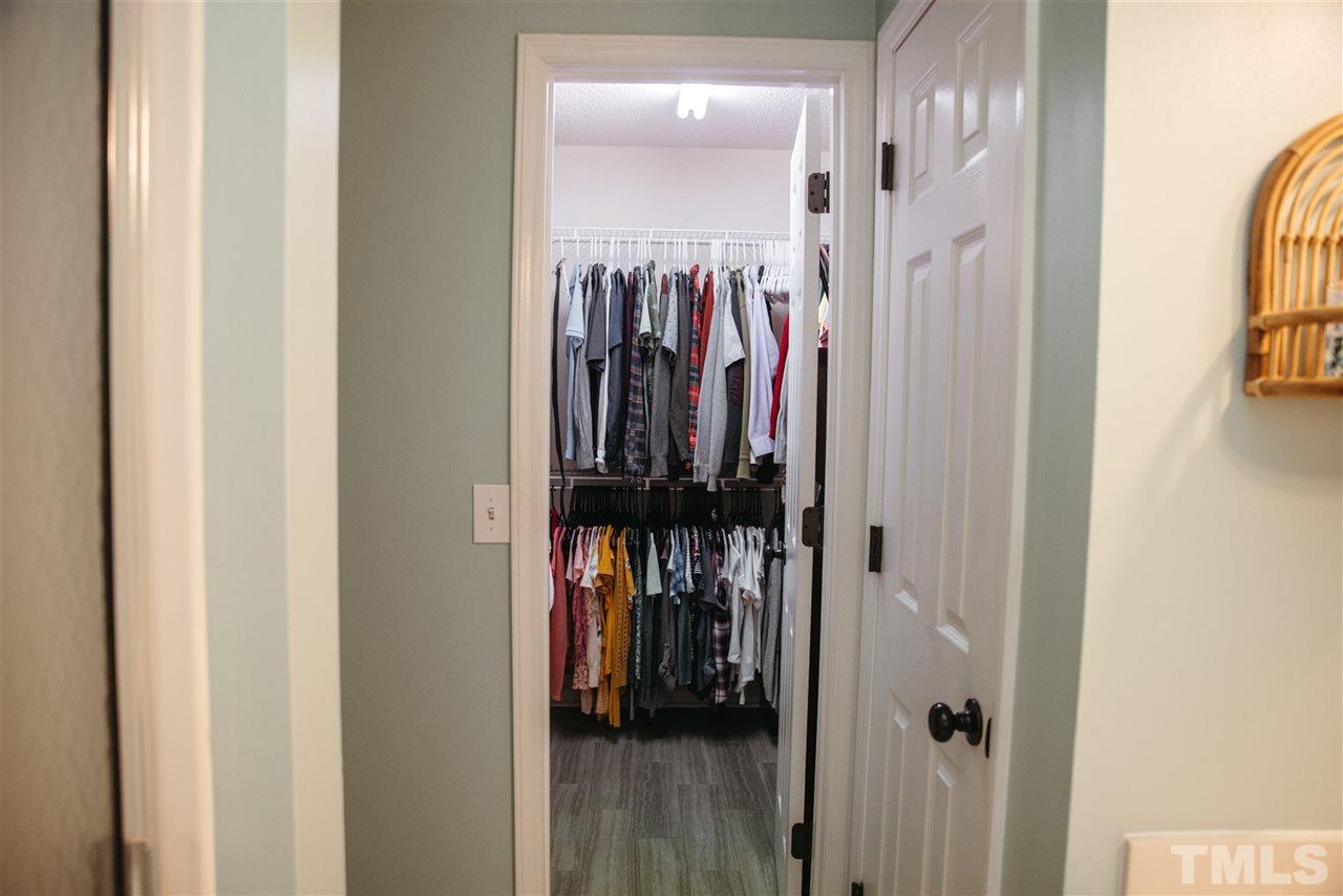 7020 Epping Forest Drive Raleigh, NC 27613 - Photo 19 of 29 a view of a hallway with a elevator