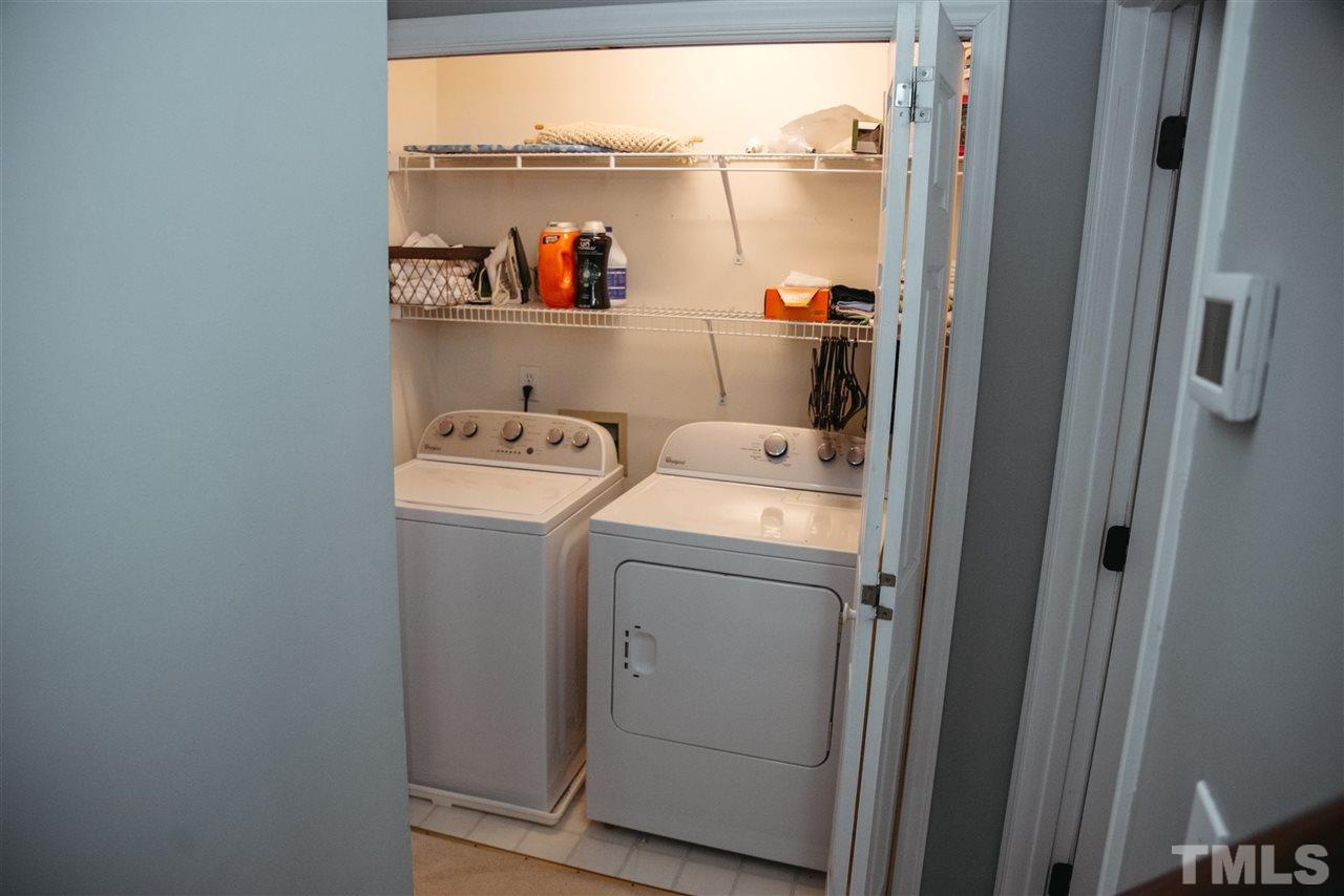7020 Epping Forest Drive Raleigh, NC 27613 - Photo 20 of 29 a utility room with dryer and washer