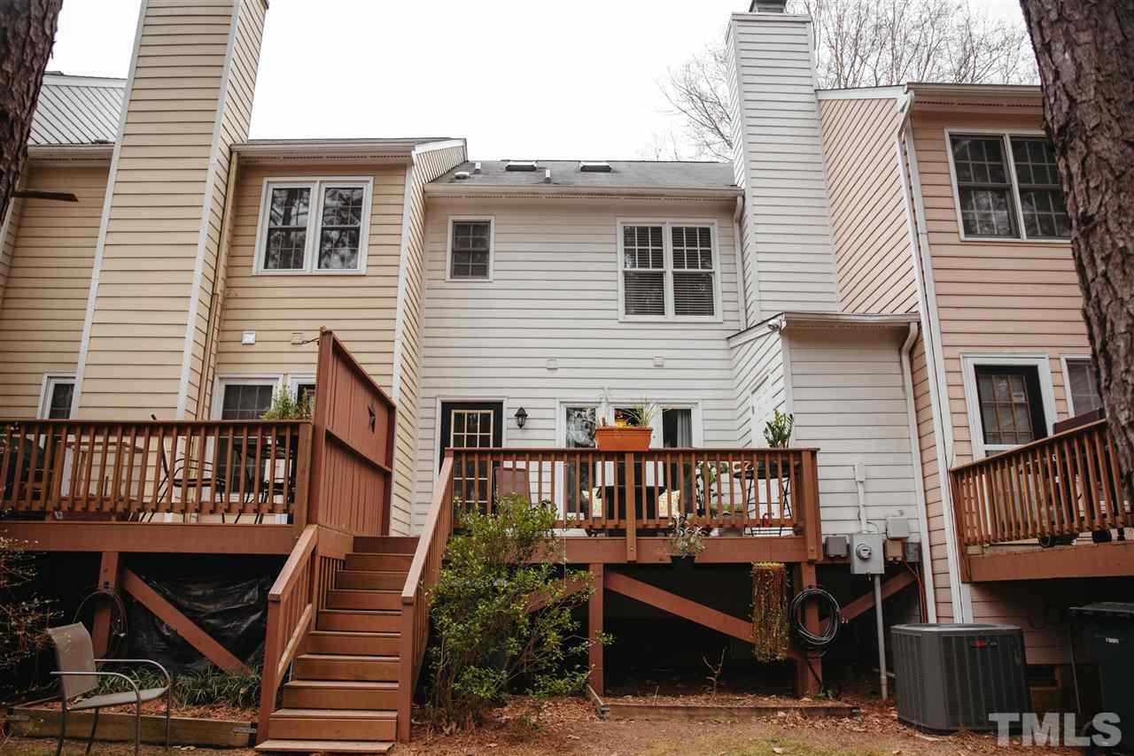 7020 Epping Forest Drive Raleigh, NC 27613 - Photo 24 of 29 a view of a house with wooden deck