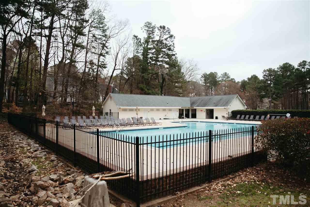7020 Epping Forest Drive Raleigh, NC 27613 - Photo 26 of 29 a house view with a deck and garden