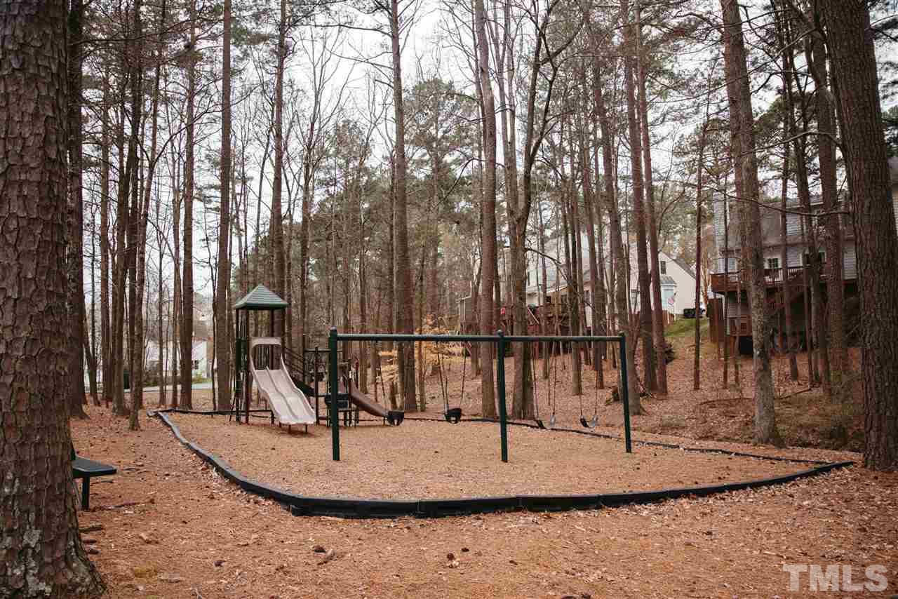 7020 Epping Forest Drive Raleigh, NC 27613 - Photo 28 of 29 a view of a park with swings