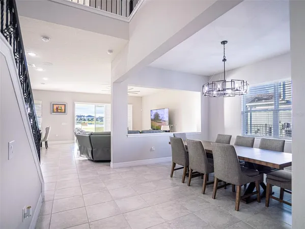 a kitchen with granite countertop a sink a counter top space appliances and cabinets