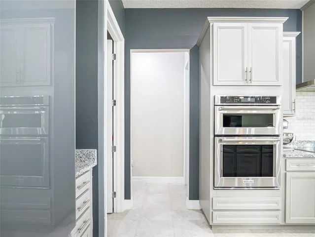 a view of a hallway with a window