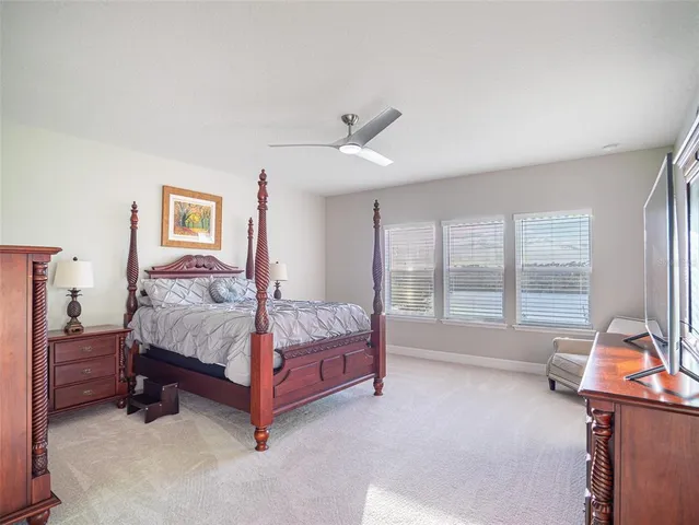 a bathroom with a granite countertop sink