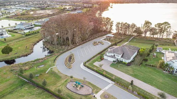a view of a street with a building in the background