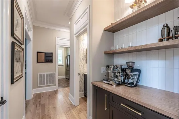 a kitchen with stainless steel appliances granite countertop a sink and cabinets