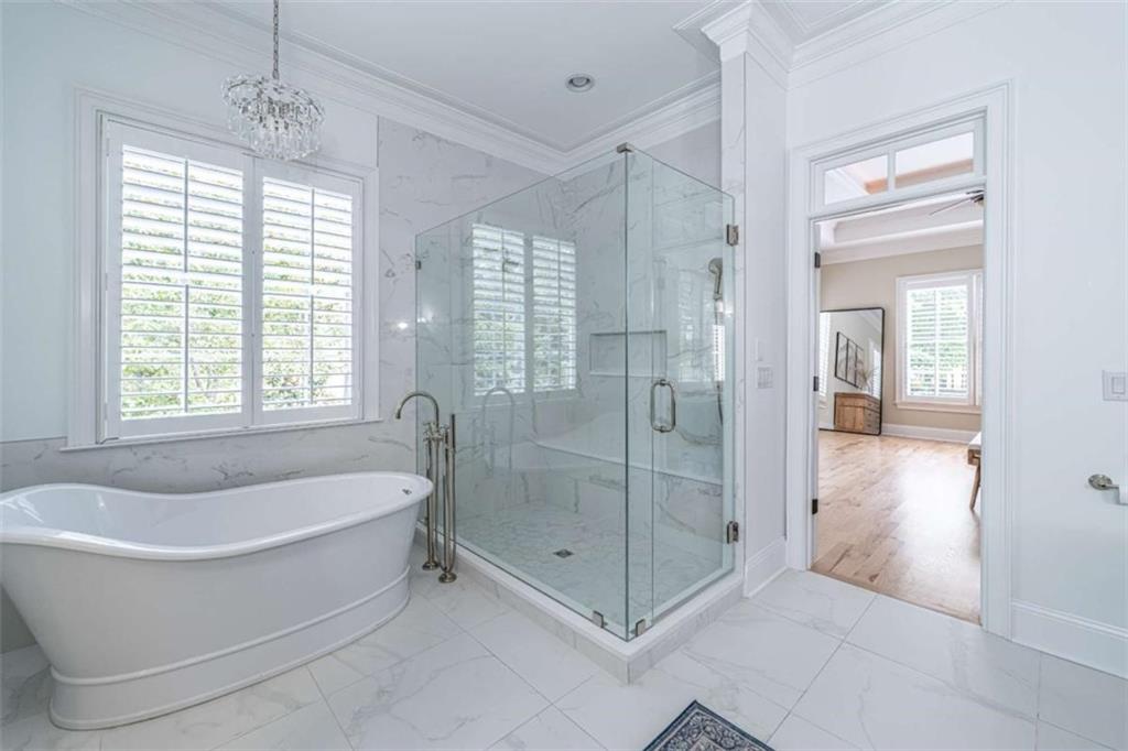 138 Nelson Boulevard Northwest Rome, GA 30165 - Photo 18 of 39 a white bath tub sitting next to a shower