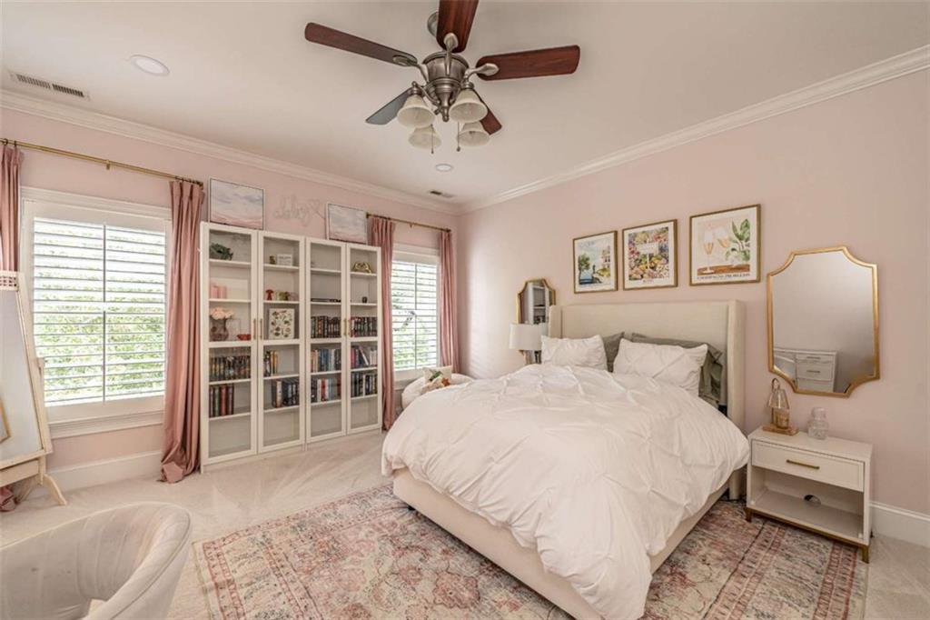 138 Nelson Boulevard Northwest Rome, GA 30165 - Photo 26 of 39 a spacious bedroom with a large bed and a window
