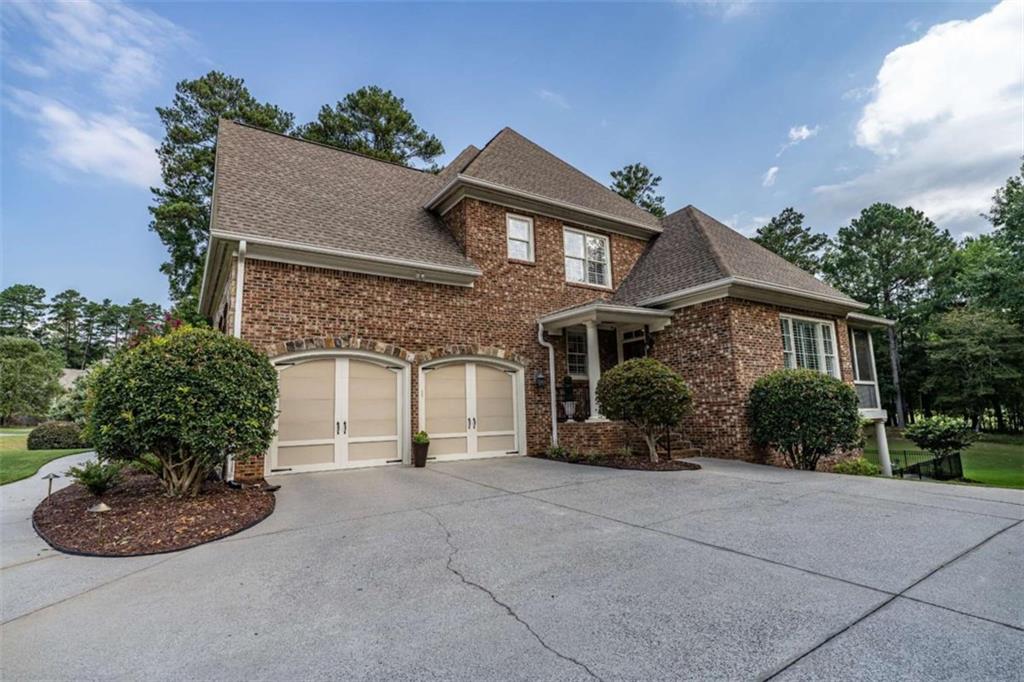 138 Nelson Boulevard Northwest Rome, GA 30165 - Photo 5 of 39 front view of a house with a yard