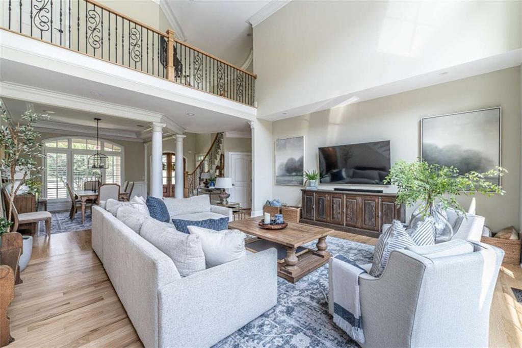 138 Nelson Boulevard Northwest Rome, GA 30165 - Photo 6 of 39 a living room with furniture and a flat screen tv
