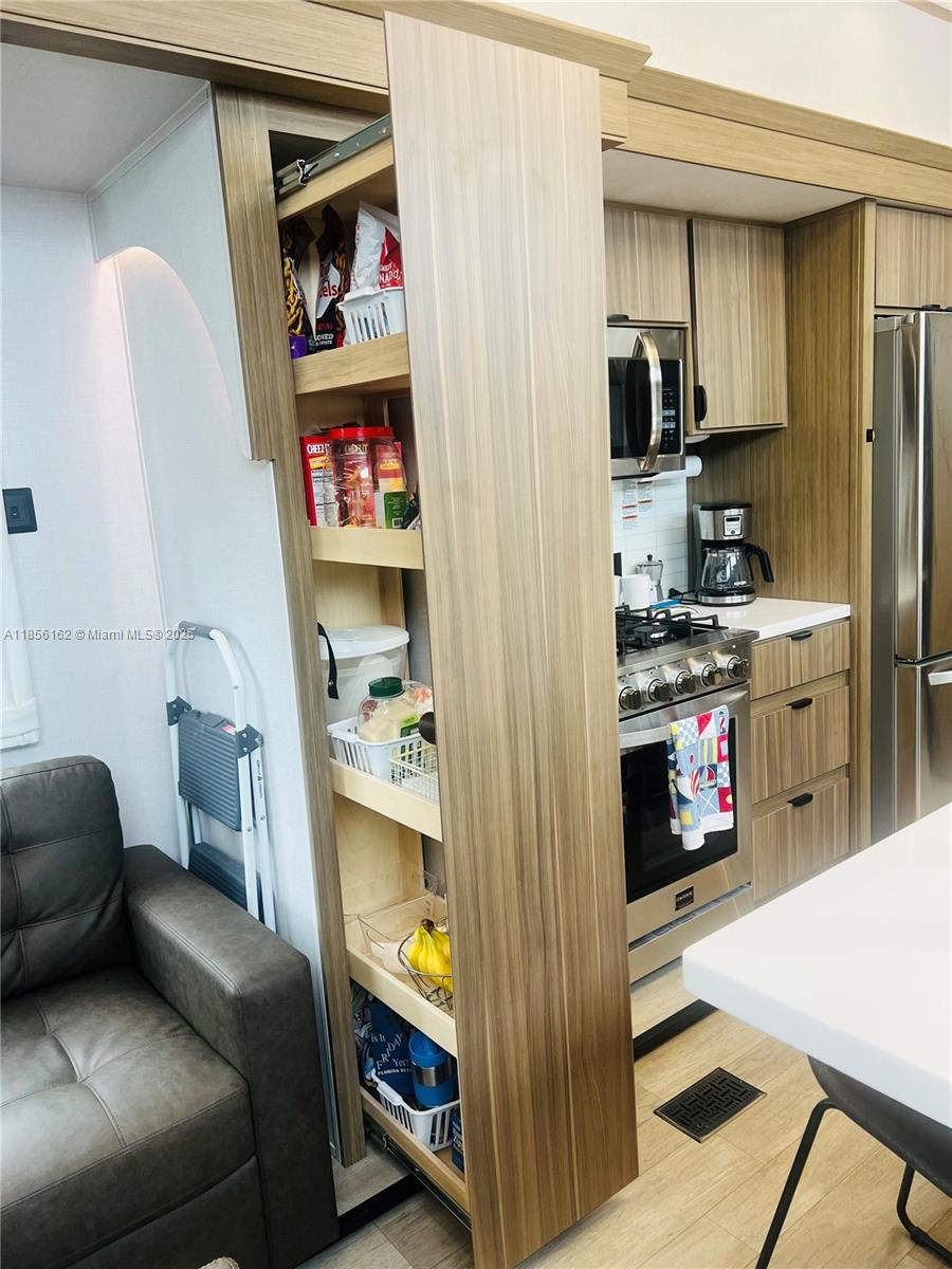 325 Calusa Street Key Largo, FL 33037 - Photo 14 of 28 Modern pull-out drawer pantry