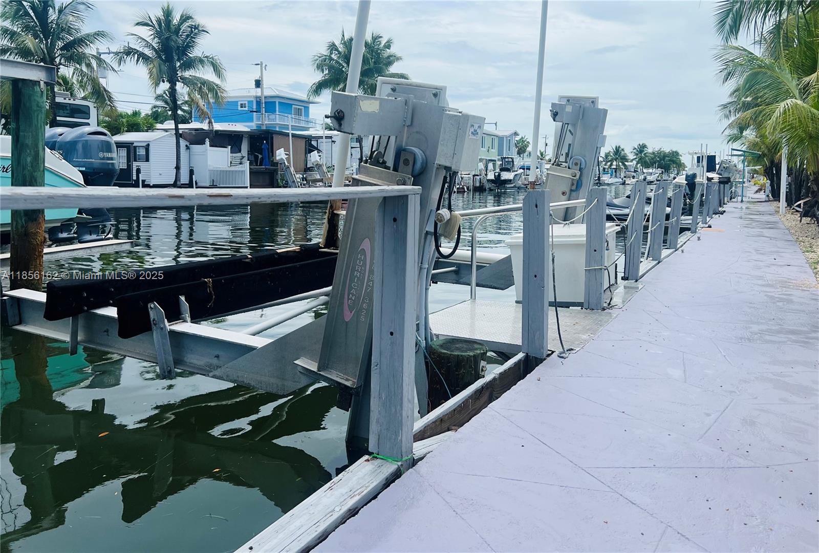 325 Calusa Street Key Largo, FL 33037 - Photo 5 of 28 43’ Dock with 15,000 lb Boat Lift
