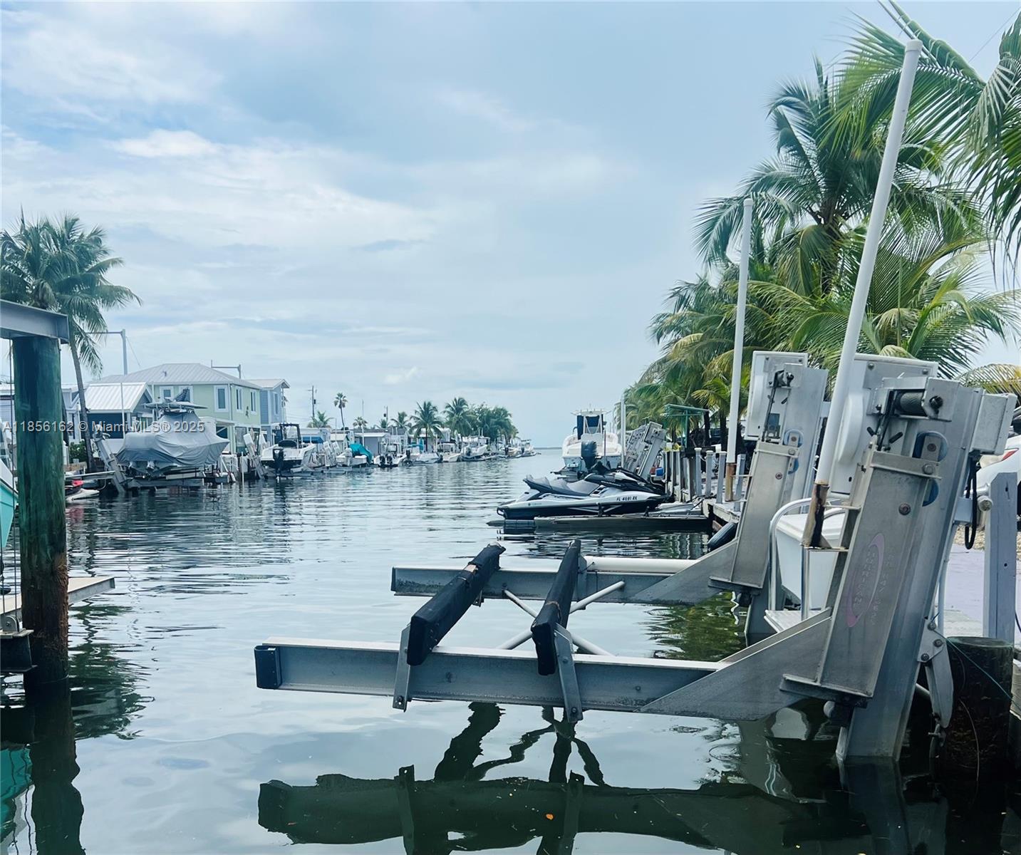 325 Calusa Street Key Largo, FL 33037 - Photo 6 of 28 43’ Dock with 15,000 lb Boat Lift