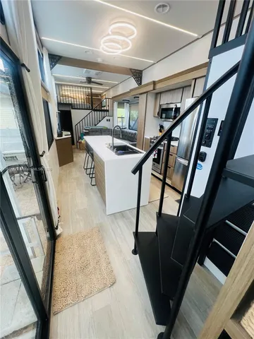 a view of an chairs and table in the kitchen