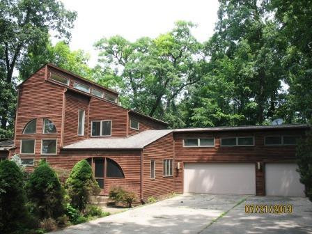 109 Island Lake Road Chelsea, MI 48118 - Photo 1 of 18 Front w/3 car garage