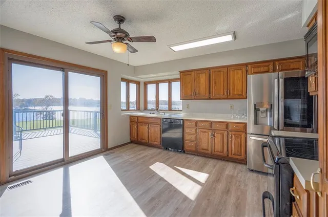 $550,000 | 4910 Northeast Pebble Beach Street, Lee's Summit, MO 64064