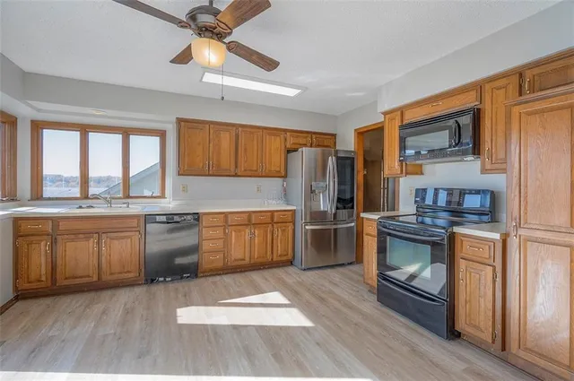 $550,000 | 4910 Northeast Pebble Beach Street, Lee's Summit, MO 64064