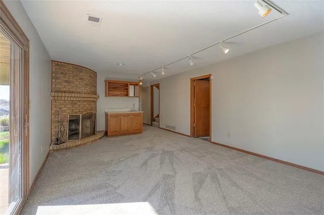 $550,000 | 4910 Northeast Pebble Beach Street, Lee's Summit, MO 64064