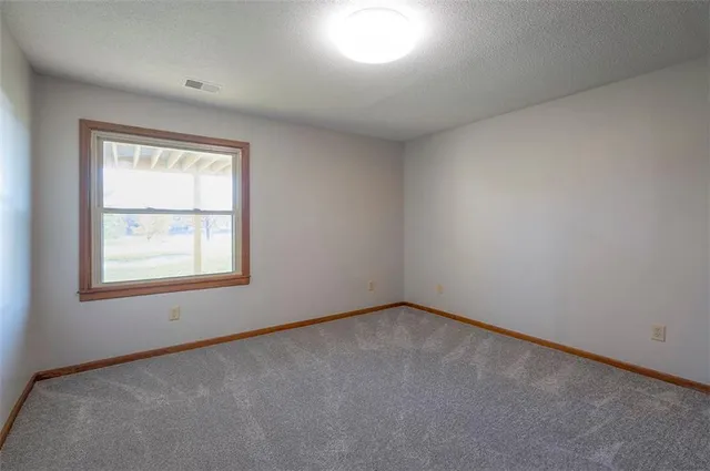 $550,000 | 4910 Northeast Pebble Beach Street, Lee's Summit, MO 64064