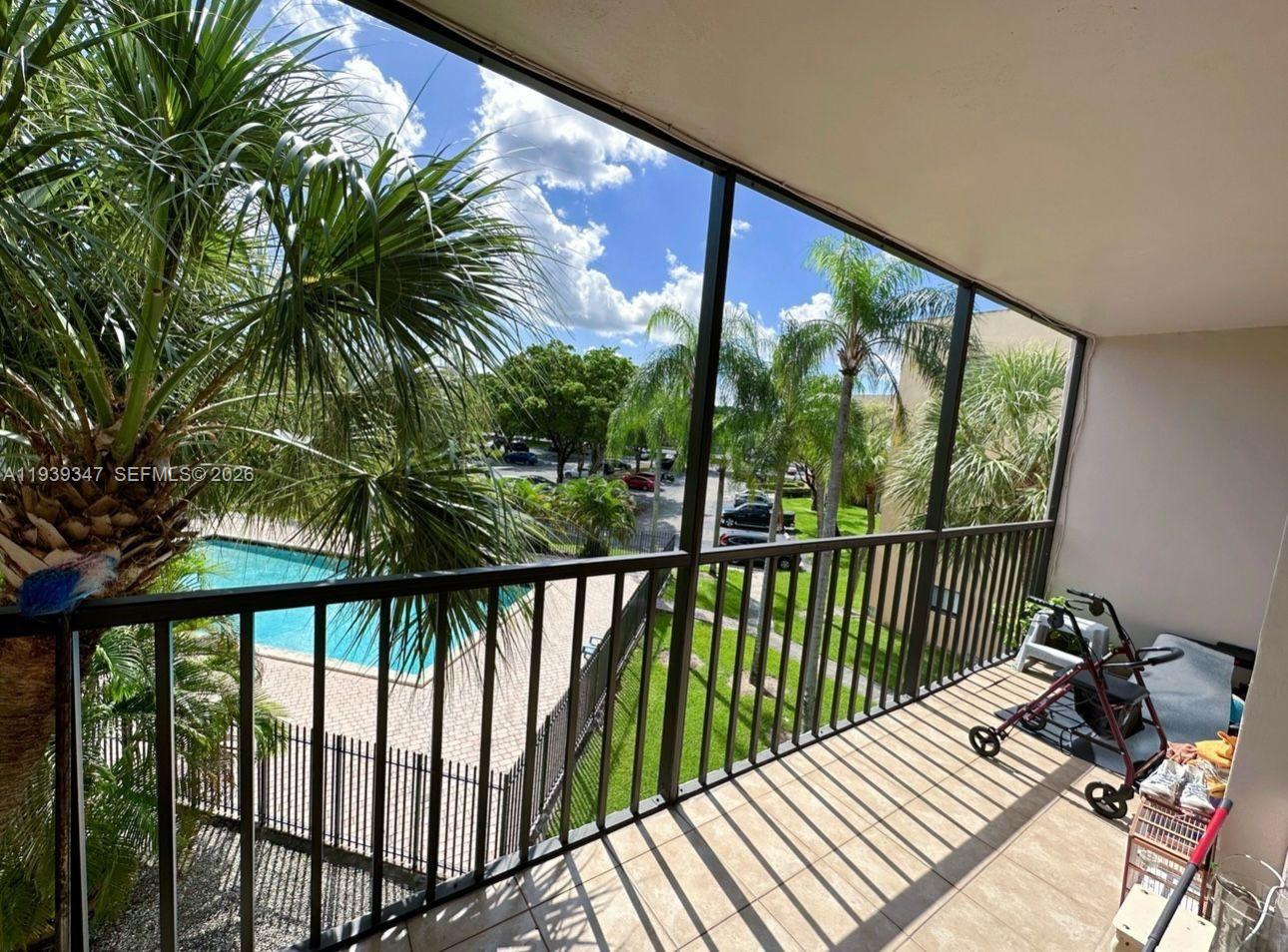8540 Southwest 133rd Avenue Road, Unit 312 Miami, FL 33183 - Photo 14 of 15 a view of balcony with furniture