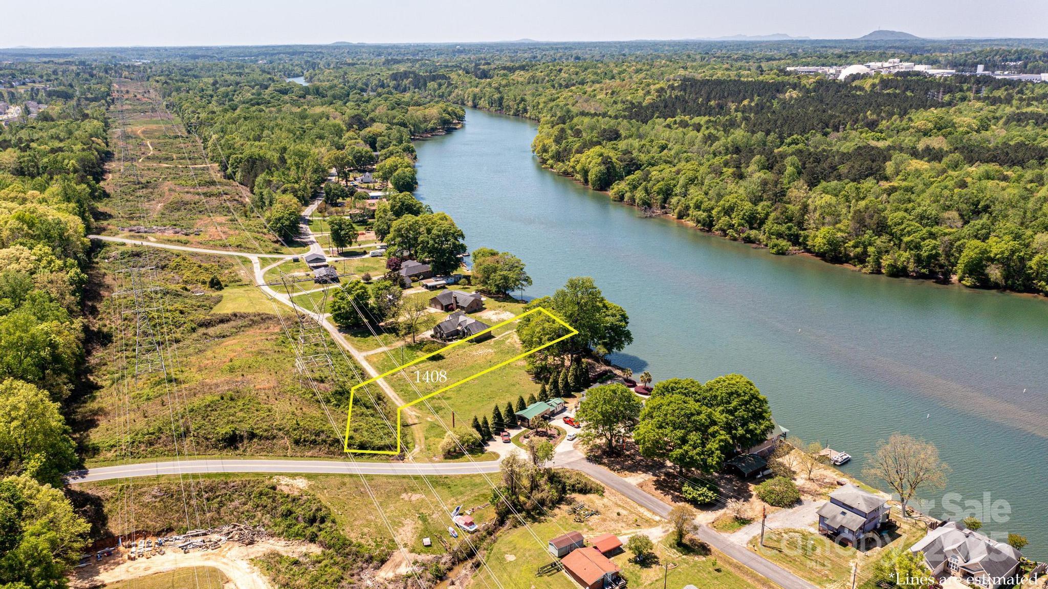 1408 Hart Road Charlotte, NC 28214 - Photo 3 of 7 a view of a lake with a mountain view