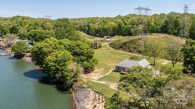 a view of a lake with a yard