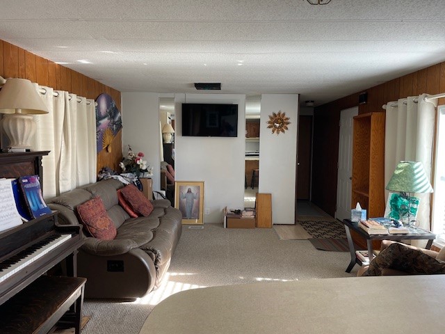 771 County Road 261 Comanche, TX 76442 - Photo 3 of 7 a living room with furniture a large window and flat screen tv